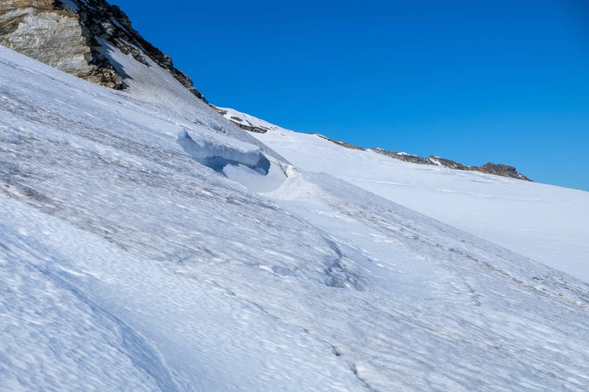 Snow-covered glacier crevasse